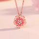 Auranudge Blossom Shift Kinetic Necklace in its folded peach blossom state, crafted from sterling silver.