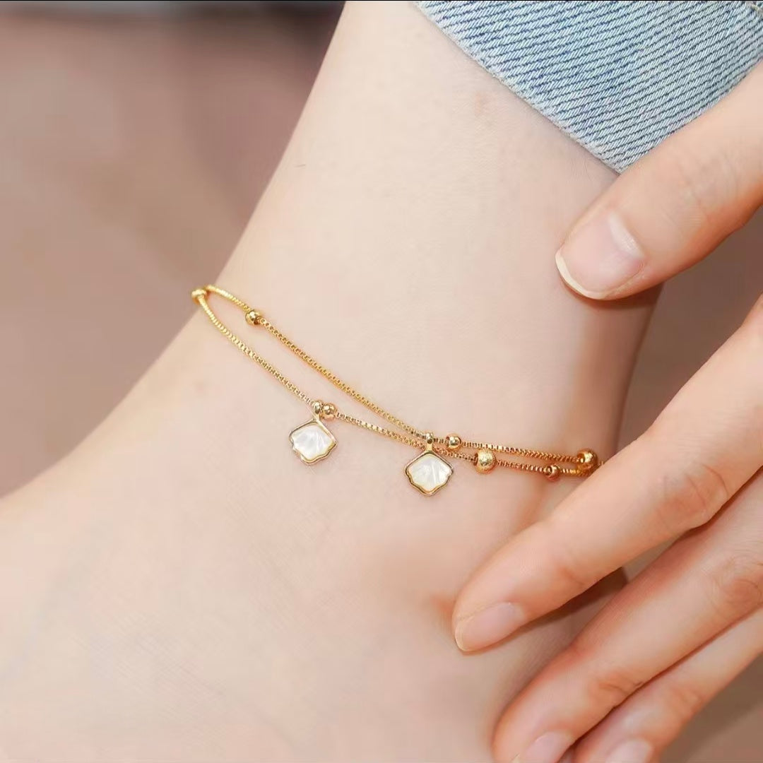 The Science of the "Visual Sink": Why Shell Anklets are Dominating 2026 Summer Trends