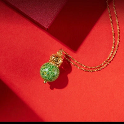 AuraNudge Momentum Gourd: Empower Your Vision with Artisanal Verdigris Brass