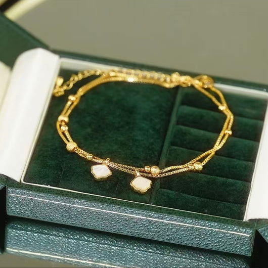 Oceanic Whisper: Layered Shell Anklet in Radiant Gold-Finish & Mother of Pearl