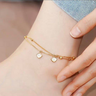 Oceanic Whisper: Layered Shell Anklet in Radiant Gold-Finish & Mother of Pearl